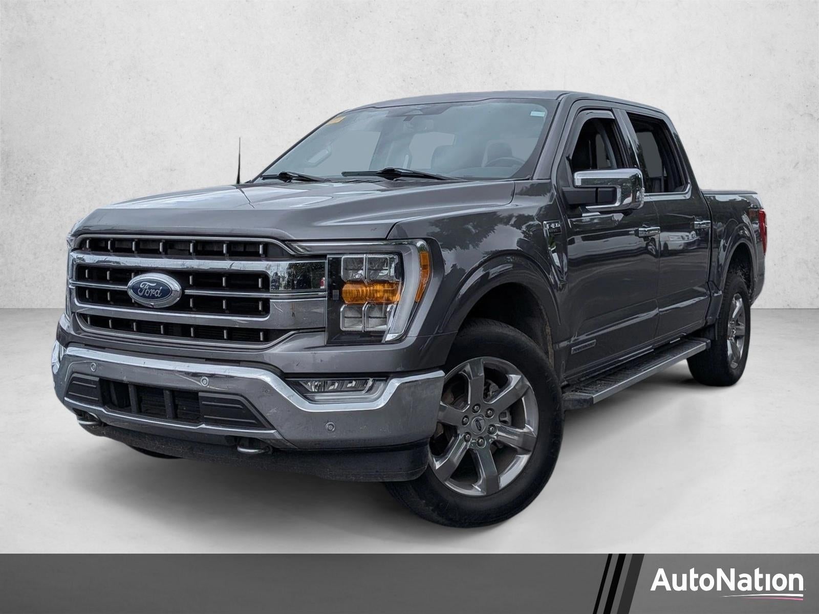 2023 Ford F-150 LARIAT 4WD SuperCrew 5.5' Box in Carbonized Gray Metallic — front three-quarter view