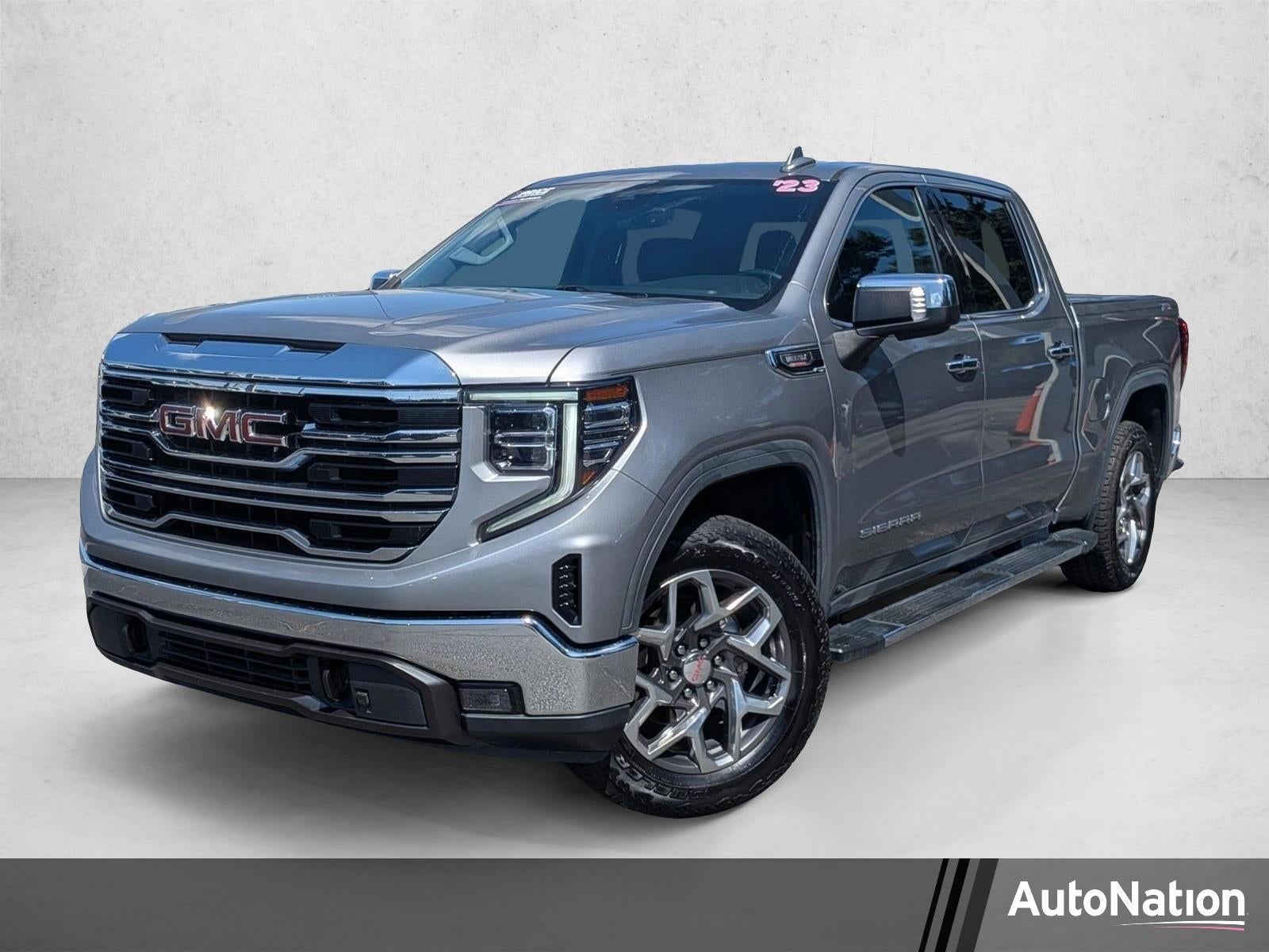 2023 GMC Sierra 1500 Crew Cab Short Box 4-Wheel Drive SLT in Sterling Metallic — front three-quarter view