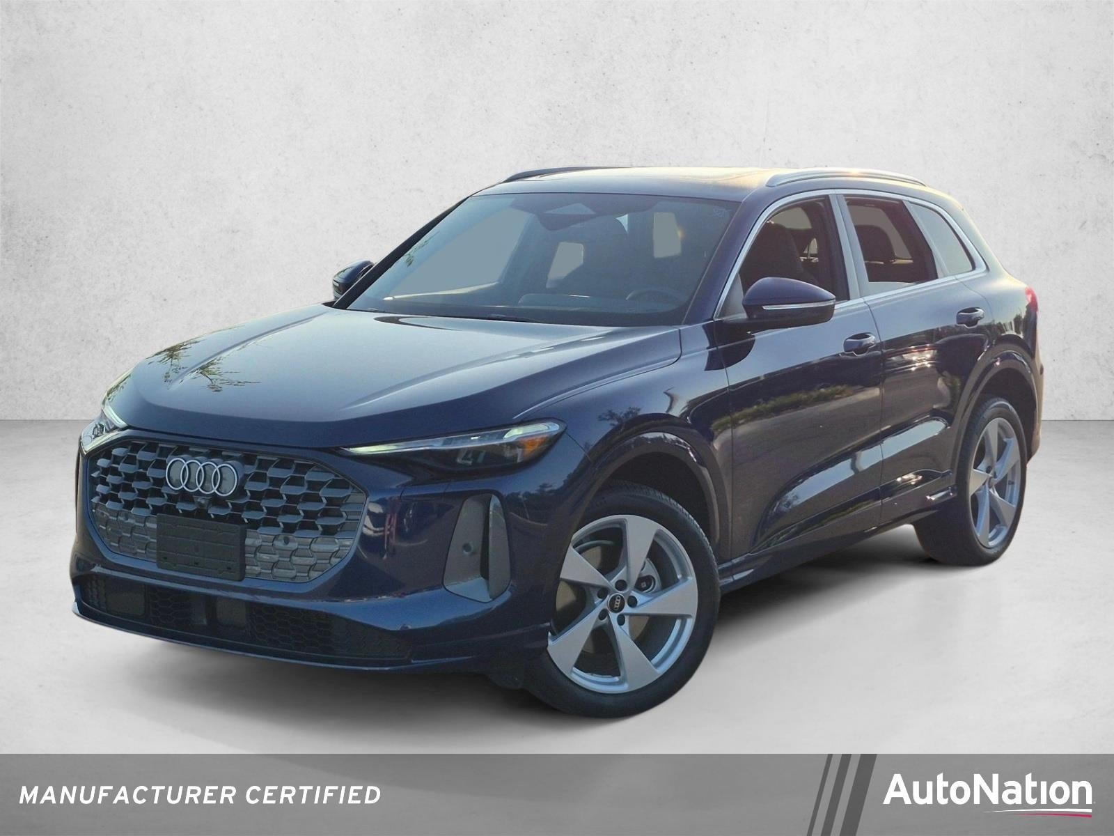 2025 Audi Q5 Premium Plus 2.0 TFSI quattro in Navarra Blue Metallic — front three-quarter view