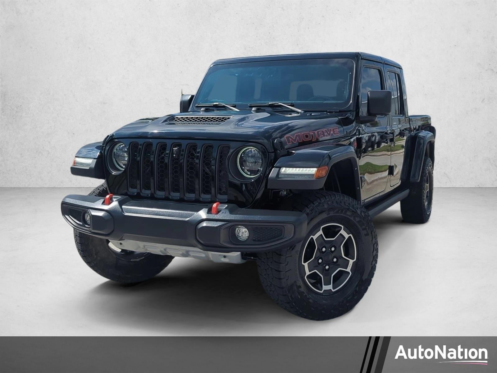 2023 Jeep Gladiator Mojave 4x4 in Black Clearcoat — front three-quarter view