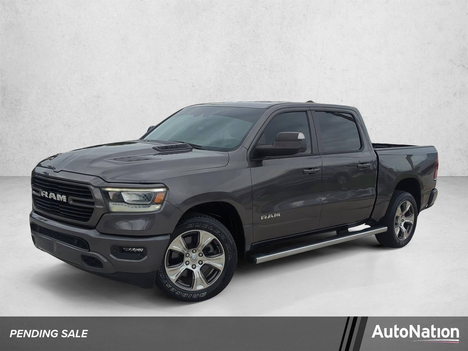 2023 RAM 1500 Laramie 4x2 Crew Cab 5'7" Box in Granite Crystal Metallic Clearcoat — front three-quarter view