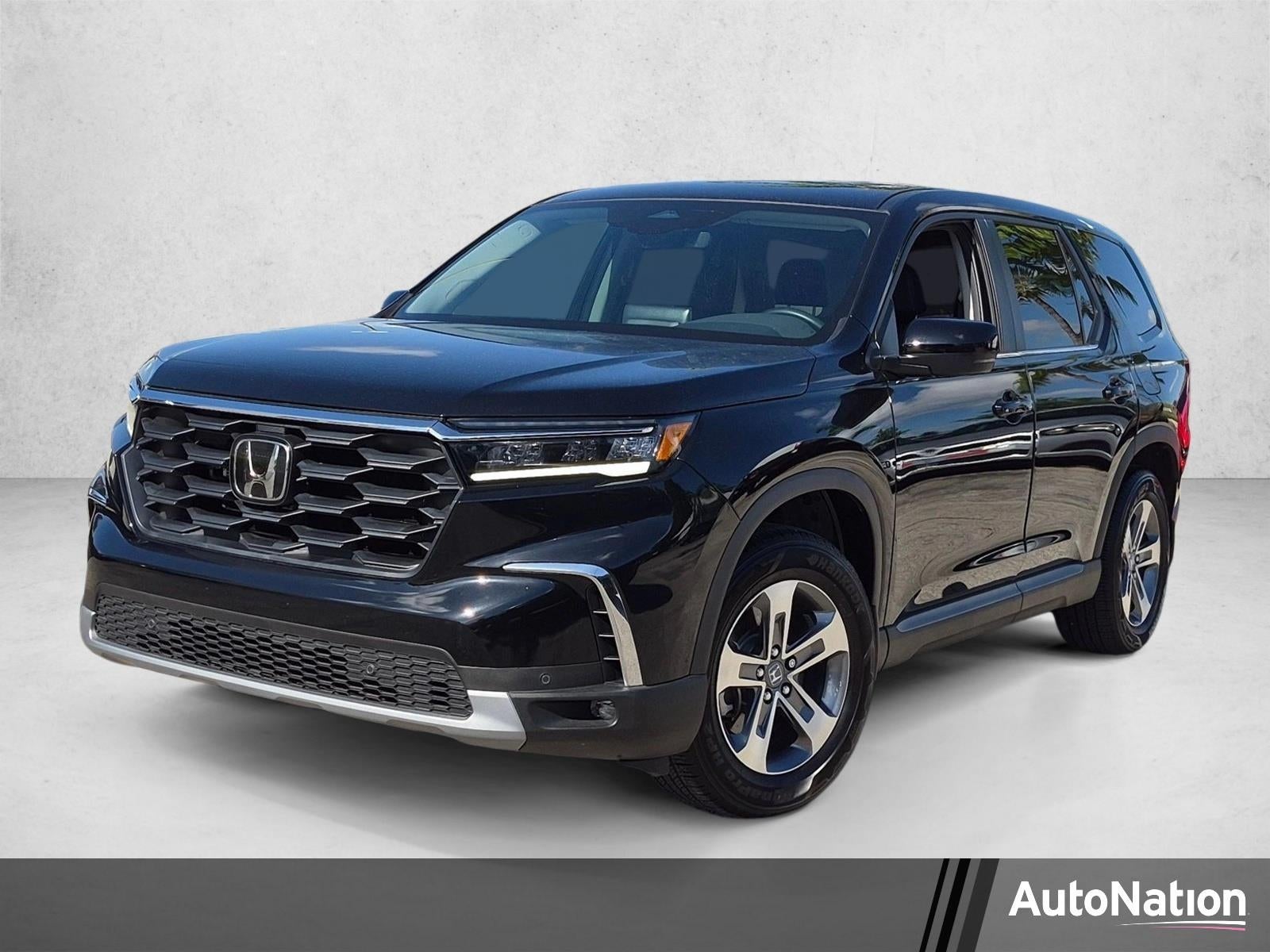 2025 Honda Pilot EX-L 2WD in Obsidian Blue Pearl — front three-quarter view