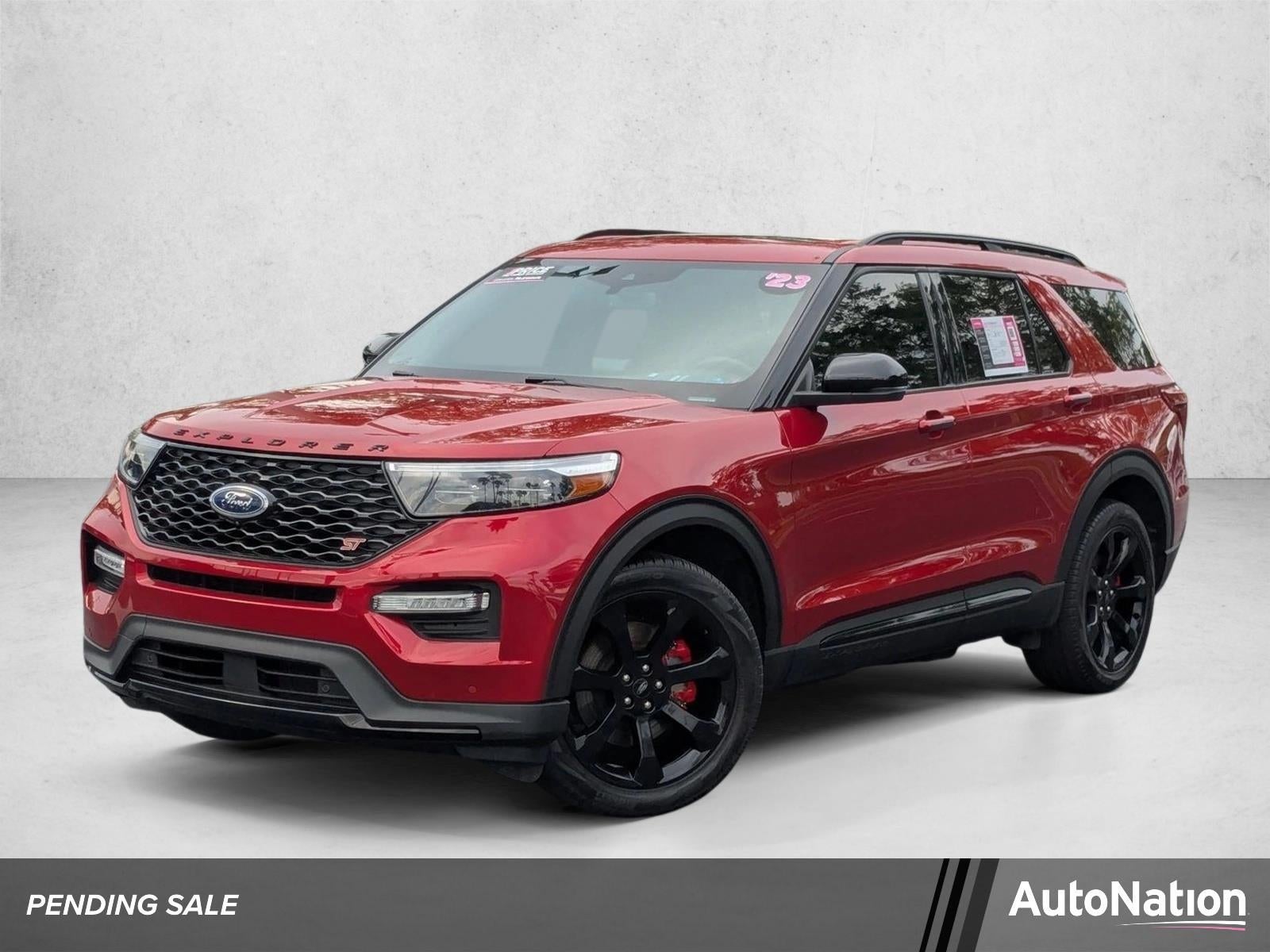 2023 Ford Explorer ST 4WD in Rapid Red Metallic Tinted Clearcoat — front three-quarter view