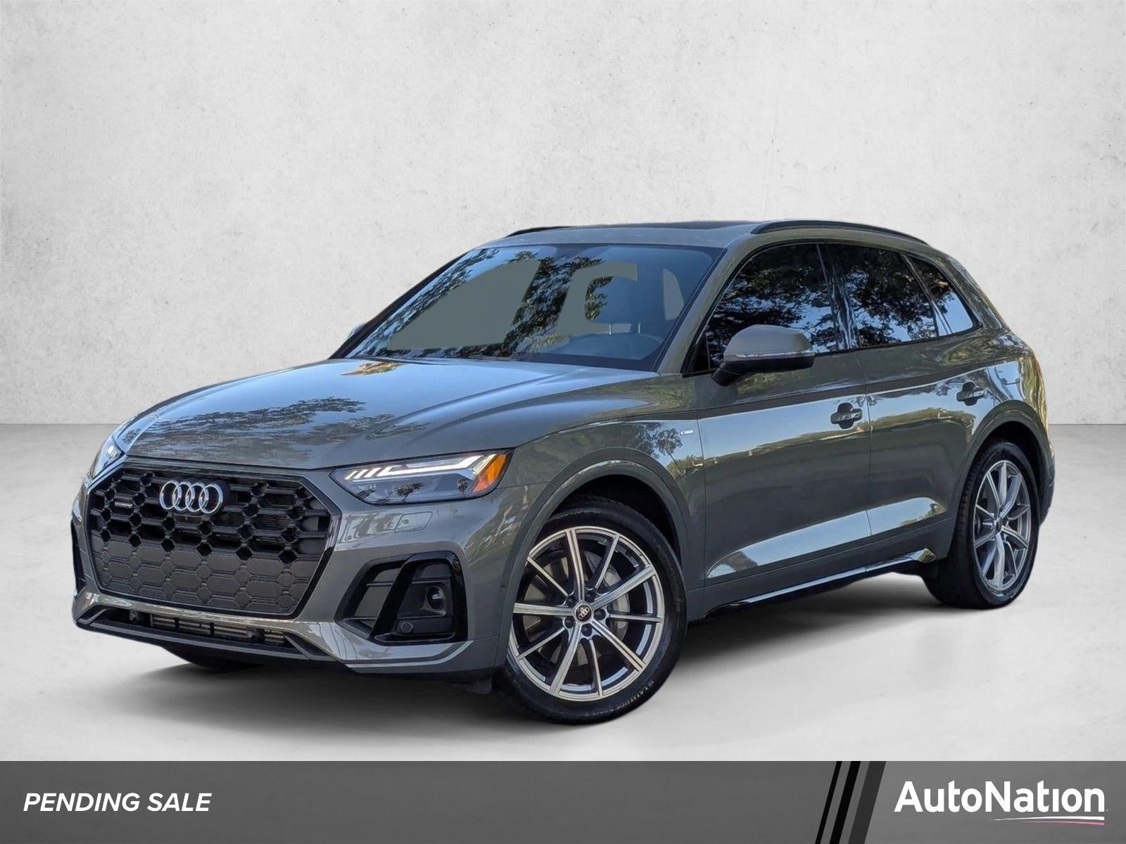 2023 Audi Q5 S line Prestige 55 TFSI e quattro in Chronos Gray Metallic — front three-quarter view