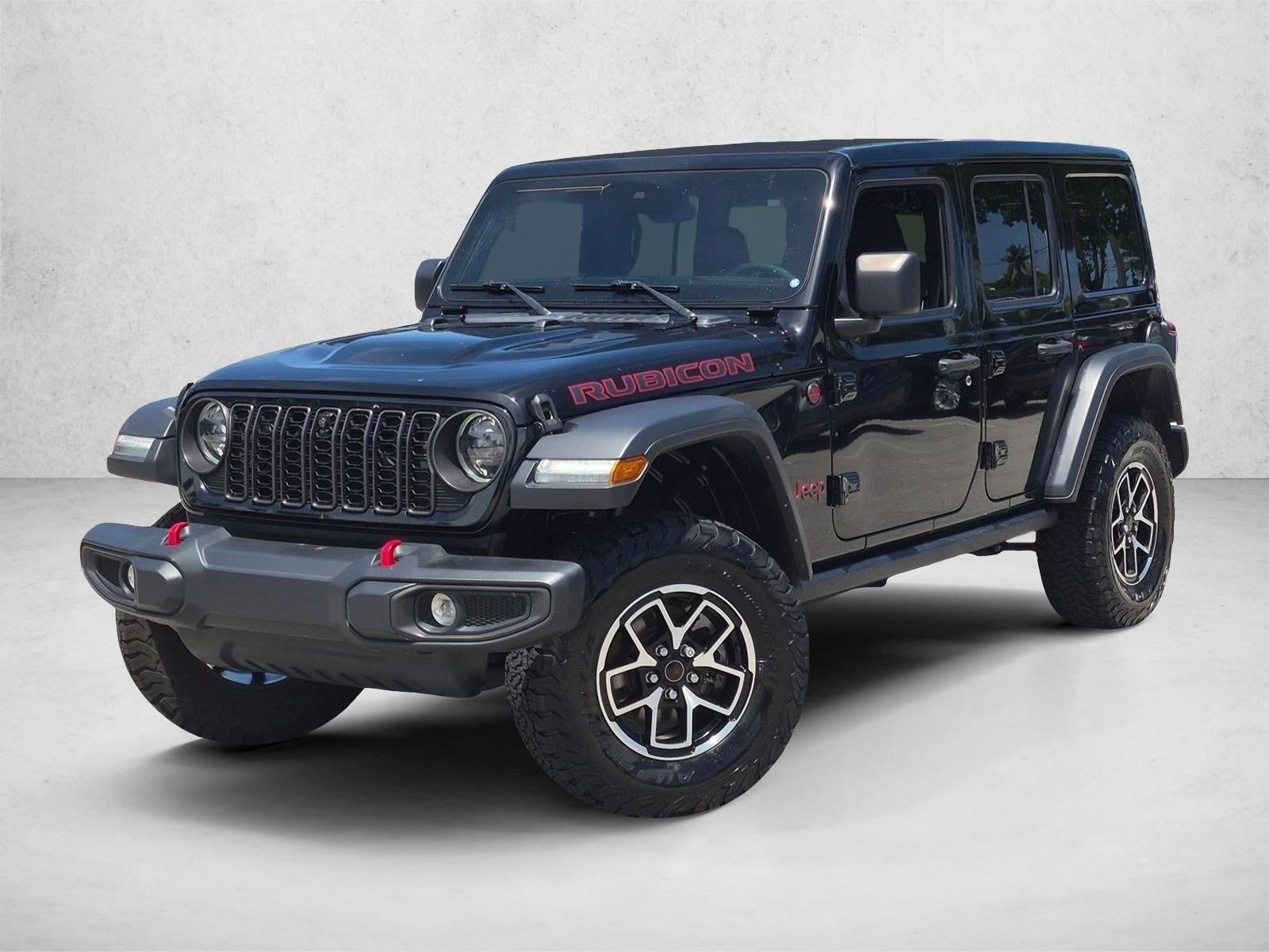 2024 Jeep Wrangler Rubicon 4 Door 4x4 in Black Clearcoat — front three-quarter view