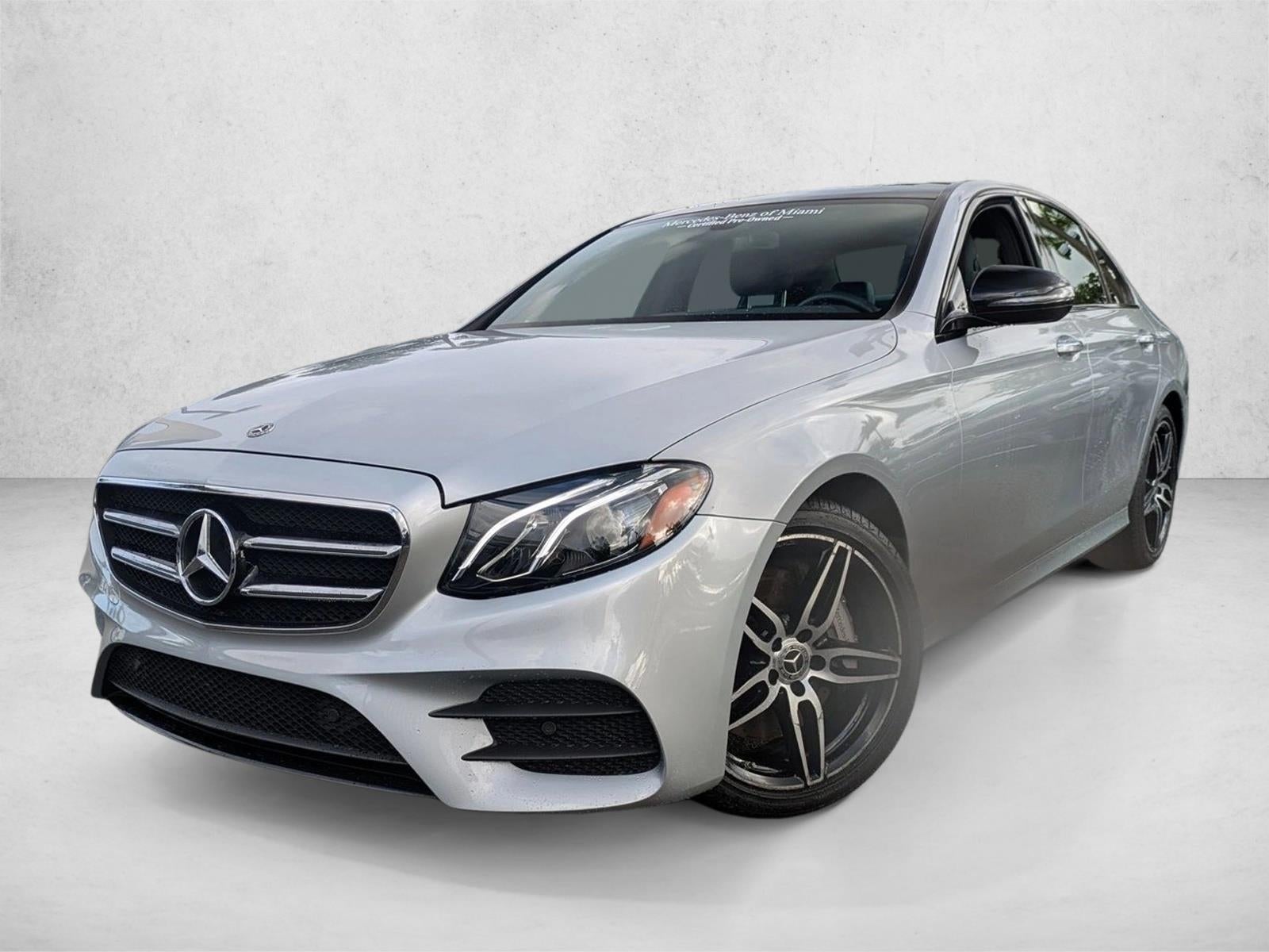 2020 Mercedes-Benz E-Class E 450 4MATIC® Sedan in Iridium Silver Metallic — front three-quarter view